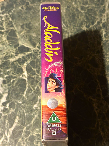 Walt disney home video - walt, aladdin